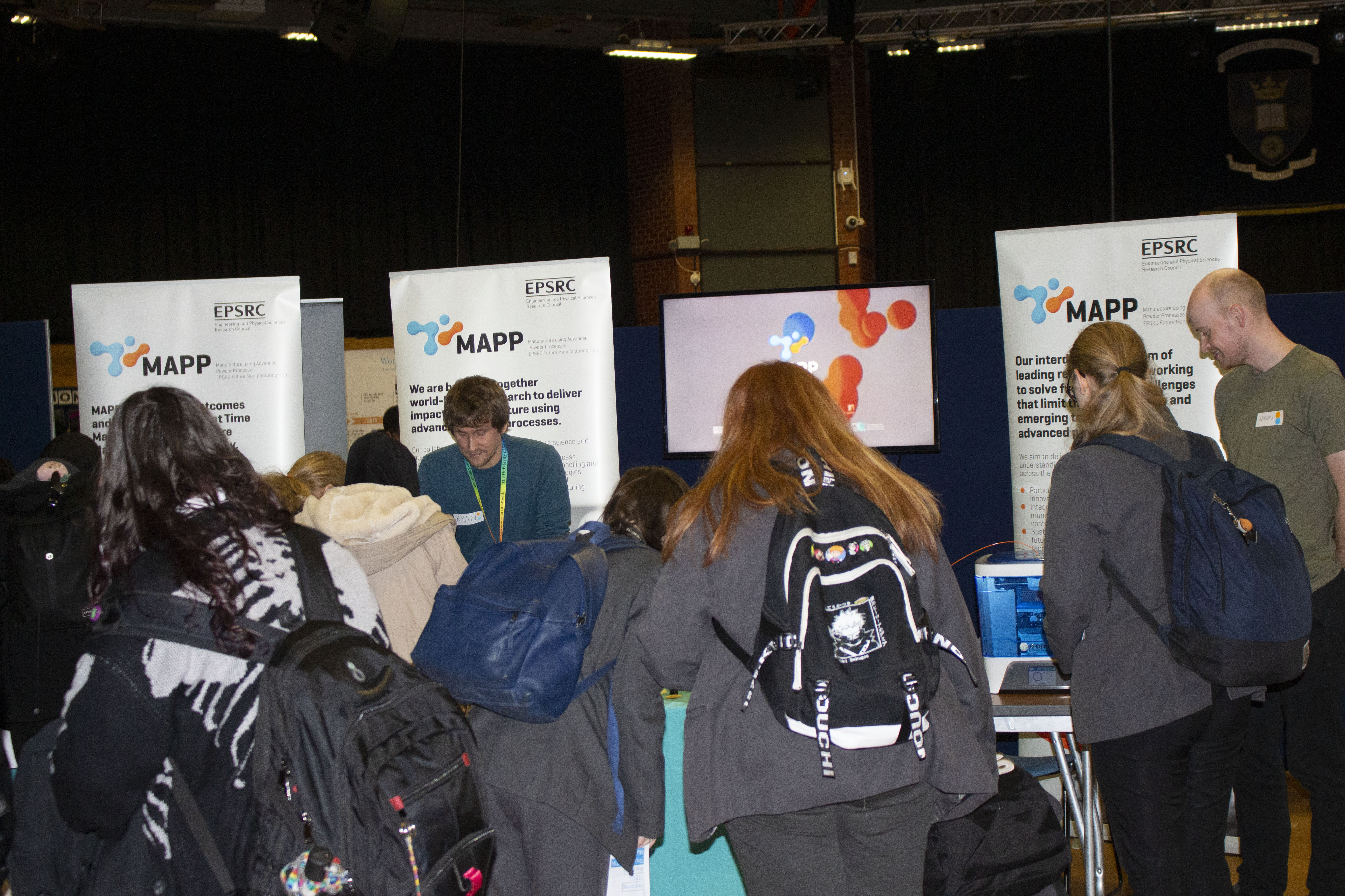 The busy MAPP stand at Exploring STEM for Girls in 2022 - School pupils visit the MAPP stand at Exploring STEM for Girls in 2022