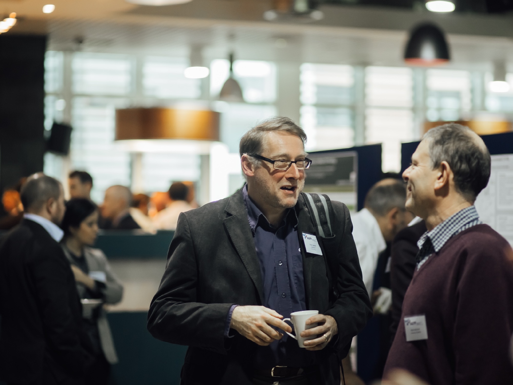 Two attendees networking at the MAPP launch event - Two attendees networking at the MAPP launch event