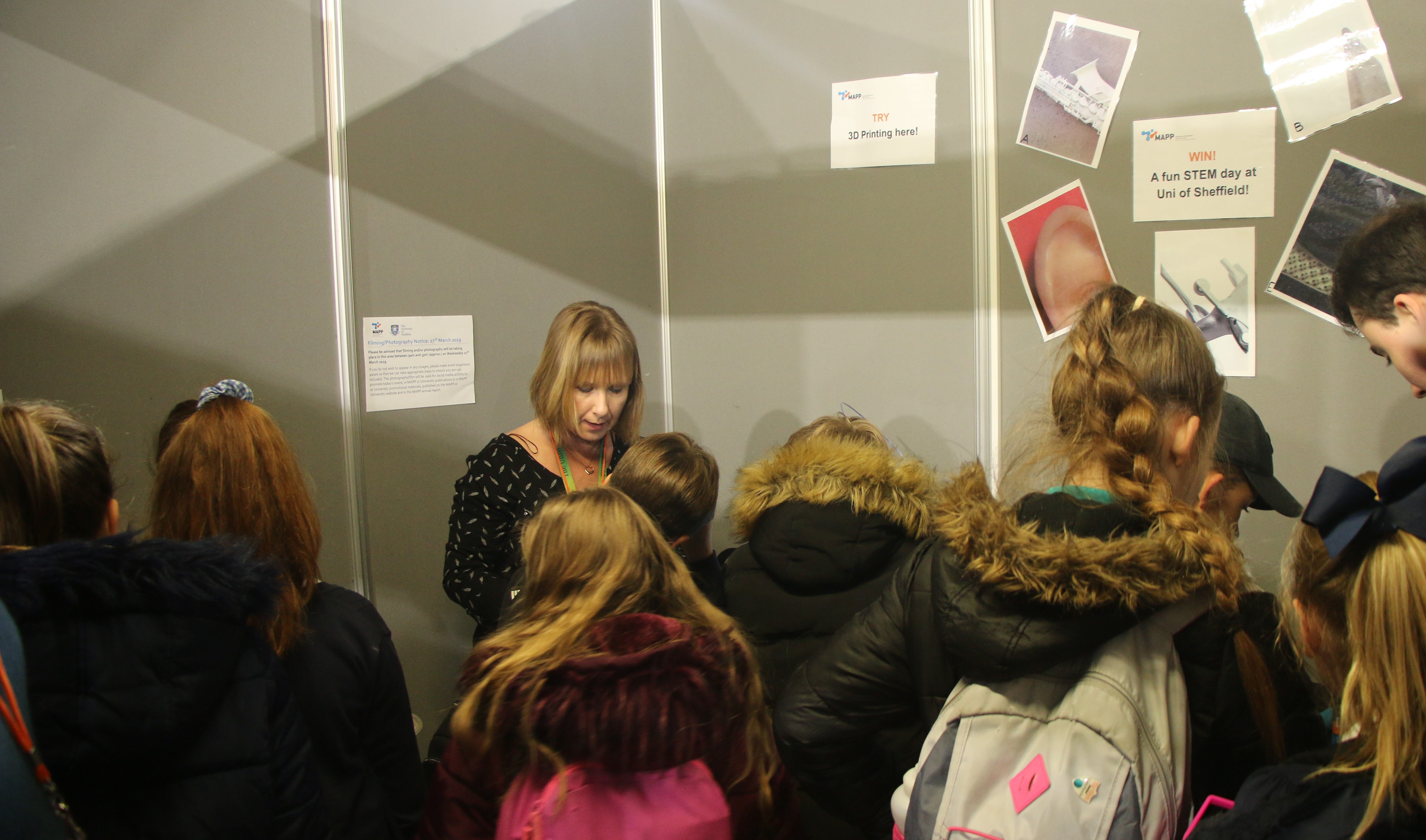 Project manager Karen Wood speaks to young people at MAPP's busy stand at the Get Up to Speed event