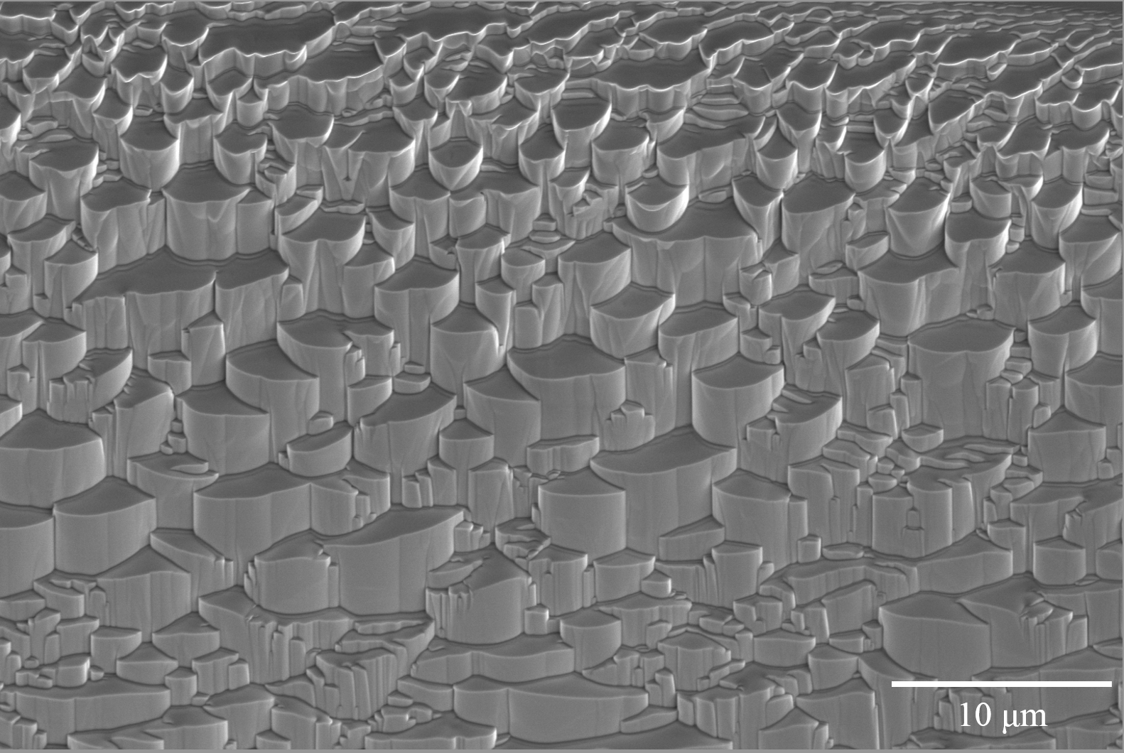 Steps to nowhere - Max Chester Jude Emmanuel - SEM image of SiC milled at 30kV 2.5 μA using a Xenon source on the Helios 5 Hydra DualBeam microscope captured in SE mode.